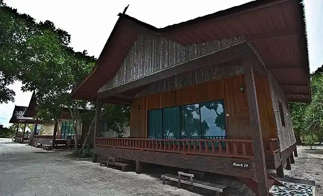 Luxurious Garden Villas nestled in the sand at the 5-star Pom Pom Island Resort, offering a private and tranquil stay for a honeymoon or dive holiday.