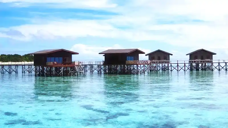 Beautiful overwater sea villas at the 5-star Pom Pom Island Resort, offering a luxury private island experience in Sabah, Malaysia.