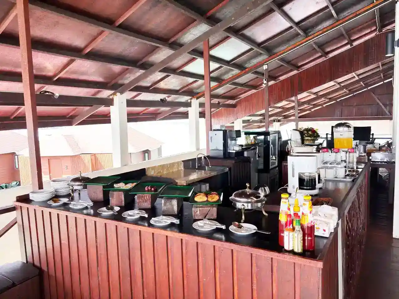 Breakfast buffet spread at the open-air restaurant of Sea Star Resort, offering a variety of dishes for guests to start their day.